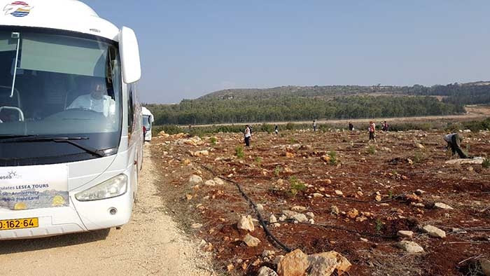 Bus dropping us off to plant trees in Israel